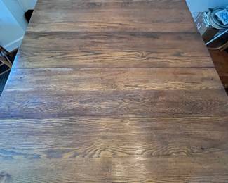 C8 - $250. Solid Oak Dining Table with single leaf. Measures 42" x 52" x 31" tall. 5 regular chairs. 1 captains chair. Table is sturdy & solid!