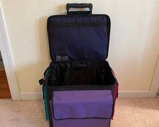 C62 - $75. Craft Matters 3 Piece Rolling Craft Storage Case. Largest piece is 18" x 15" x 16" tall. 