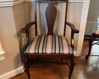 C19 - $45. Single Arm Chair. Measures 21.5" wide x 20" deep x 39" tall. (Upholstery matches dining set - similar style)