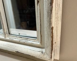 C106 - $140. Pair of Window Style Mirrors by Enchante. Measures 29.25" wide x 40.5" tall. 