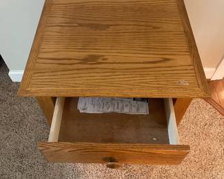 C31 - $40. Single Wooden Side Table with drawer. Measures 20" square x 25.25" tall. 1 minor blemish on the top. 