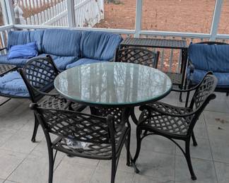 C24 - $650. Newport Arm Chairs & 42" Glass Top Dining Table. Cast Aluminum in very good condition! Gently used. Very sturdy! (Table is 42" round x 25.5" tall) (Chairs are 21" wide x 20" deep x 33" tall. Floor to seat is 17.5")