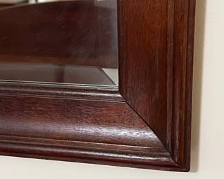 C5 - $175. Large Wall Mirror. Measures 55" x 35" tall. Solid wood frame - no name. (Matches Craftique Dresser in color.)