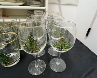 C137 - $150. Large Lot of Christmas Dishes. Glasses show the most wear on the gold trim. 
