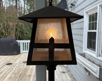 C71 - $40. Outdoor Electric Post Lamp with 2 Light Modes. Measures 70" tall. 