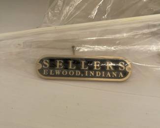 C58 - $300. Sellers Hoosier. Has been painted white. Enamel top is in good condition - some chipping that is normal for it's age. Measures 40.5" wide x 27.5" deep x 69" tall.  We have a couple bags of original hardware / tags that were taken off when it was painted. 