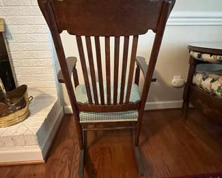 C51 - $95. Antique Solid Wood Rocker. Measures 25" wide x 31" deep x 18" floor to seat. 38" floor to top of back. 