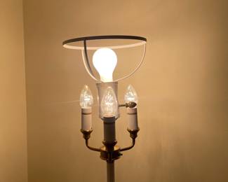 C56 - $75. Heavy Duty Brass Floor Lamp. Measures 62" tall. Bulbs can be turned on individually. Shade is in good condition! (White looks like the brass was painted). 