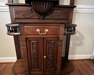 C81 - $275. Solid Wood Hall Tree - mirror has been replaced. Lots of carvings. Measures 39" wide x 16" deep x 88" tall. 