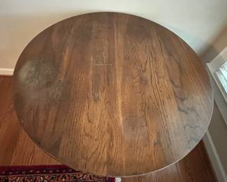 C50 - $350. Unique Antique  - "Chair Table".  As a table it measures 36" round x 29" tall. As a chair it measures 16.5" wide x 15.5" deep x 36" tall. Floor to seat is 18". 