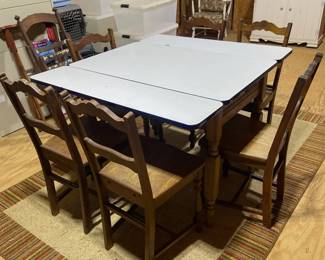 C86 - $175. Table Collapsed Measures 40" x 25" x 30" tall. Open it measures 40" x 45" x 30". Includes 6 Chairs. Enamel Coated Table Top with wood base. 6 chairs. Some rust spots & scratches but overall very good condition. Base has a sticker from Cochrane Furniture Co. Lincolnton, NC. Includes 6 Wooden Chairs. 