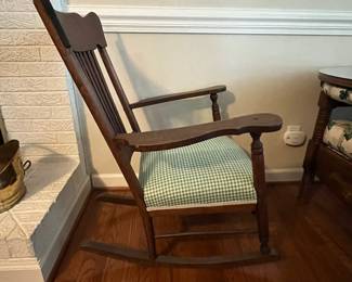 C51 - $95. Antique Solid Wood Rocker. Measures 25" wide x 31" deep x 18" floor to seat. 38" floor to top of back. 
