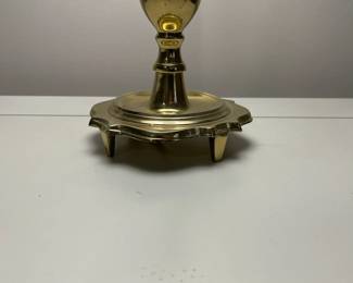 C149 - $30. Harvin Vintage Brass Lamp. Measures 24" tall. Shade has a small tear inside. 