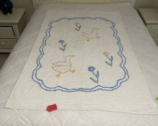 C148 - $20. 1950s Chenille Blanket. Measures 39" x 62". Has some discoloration. 
