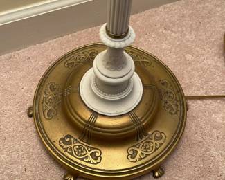 C56 - $75. Heavy Duty Brass Floor Lamp. Measures 62" tall. Bulbs can be turned on individually. Shade is in good condition! (White looks like the brass was painted). 