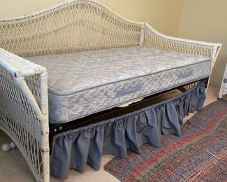 C63 - $175. Wicker Twin Sized Day Bed. Measures 89" x 40" x 43" tall. Mattress is clean and comfortable. Very good vintage condition - a few broken / split pieces on the back but they're easy to cover with pillows! Custom sewn pillowcases / blanket included if you'd like them!
