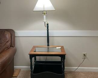 C30 - $40. Side table with Lamp. Dark green base with storage for books/magazines.  Measures 15.5" x 23" x 24" tall (with lamp is it 56.5" tall) 