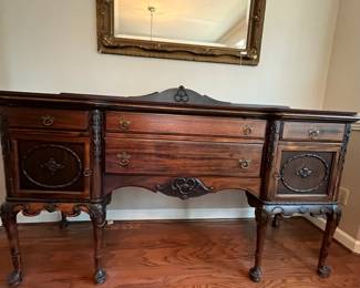 C12 - $450. Gorgeous Mahogany Buffet. Was refinished in 2011 by Mumford Restoration. Has custom made protector on the top. Measures 72" wide x 23" deep x 39.25" tall in the front. 45" tall to the tallest spot on the back. 