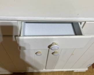 C84 - $40. Vintage White Hutch. Moves in 2 pieces for easier transport. Castors attached. Top is 36" wide x 9.5" deep x 38" tall. Base is 37" wide x 15" deep x 33" tall. 