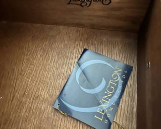 C98 - $250. Lexington Brand. Solid Wood. Flamed wood doors. Measures 46" wide x 25" deep x 76" tall. Also has another shelf if you don't have a TV in the cabinet. Moves in 2 pieces!