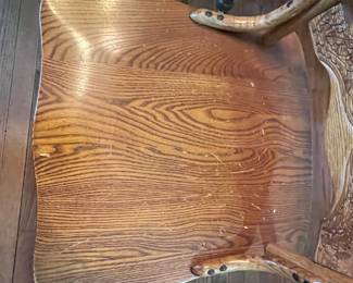 C8 - $250. Solid Oak Dining Table with single leaf. Measures 42" x 52" x 31" tall. 5 regular chairs. 1 captains chair. Table is sturdy & solid!