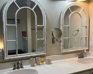 C106 - $140. Pair of Window Style Mirrors by Enchante. Measures 29.25" wide x 40.5" tall. 