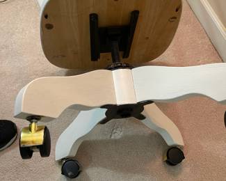 C151 - $40. Swivel Rolling Wood Office Chair. Measures 18" wide x 17" deep x 36" tall. Floor to seat is 17"
