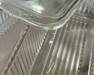 C130 - $30. 1940s Federal Glass Ribbed Refrigerator Dish Set. One minor chip noted on a lid. 