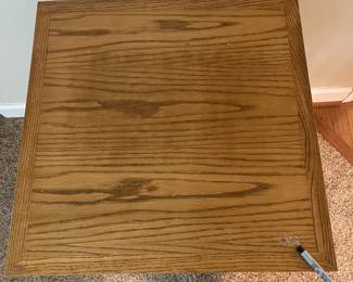 C31 - $40. Single Wooden Side Table with drawer. Measures 20" square x 25.25" tall. 1 minor blemish on the top. 