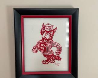 C35 - $25. Vintage 1977 NCSU Cross Stitch. Measures 12" x 14" framed. Excellent condition for the State Fans!
