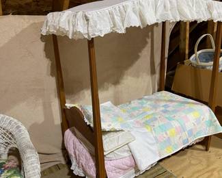 C110 - $60. Childs Toy Canopy Bed. Missing finials but could easily be replaced. Custom Handmade Bedding included. Measures 38.5" x 21.5" x 46" tall. 