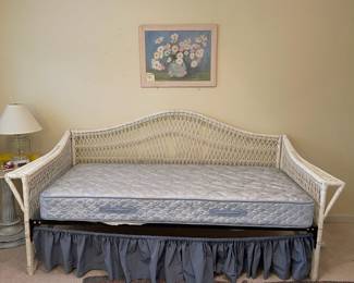 C63 - $175. Wicker Twin Sized Day Bed. Measures 89" x 40" x 43" tall. Mattress is clean and comfortable. Very good vintage condition - a few broken / split pieces on the back but they're easy to cover with pillows! Custom sewn pillowcases / blanket included if you'd like them!
