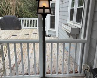 C71 - $40. Outdoor Electric Post Lamp with 2 Light Modes. Measures 70" tall. 