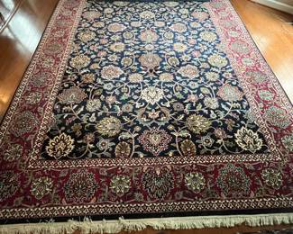 C126 - $450. Beautiful Large Area Rug. Measures 108" x 138.5". 