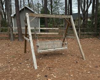 C87 - $100. Wooden Swing Frame and swing in good condition! You are responsible for transporting / disassembly. 