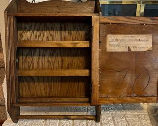 C102 - $50. Masons Towel Supply Cabinet. Measures 16.5" wide x 5" deep x 24" tall. Antique Bathroom Cabinet with Towel Rack. 