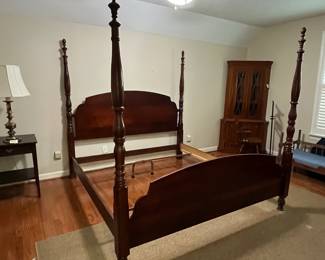C4 - $250. King Sized 4 Poster Bed. No name. Some wear along the footboard. Measures 81.5" wide x 89" long x 80" tall. 