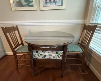 C50 - $350. Unique Antique  - "Chair Table".  As a table it measures 36" round x 29" tall. As a chair it measures 16.5" wide x 15.5" deep x 36" tall. Floor to seat is 18". 