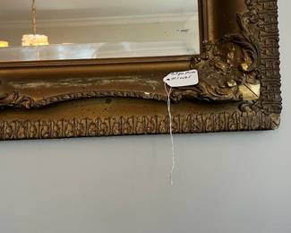C11 - $150. Antique Wooden Framed mirror with plaster over. Measures 48.5" wide x 26.5" tall. 