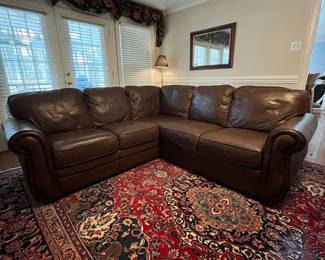 C83 - $500. Viceroy Leather Sectional. (Needs cleaned from dog hair) No rips / holes etc. Leather, Mocha, Hazelnut. Measures 87" from each corner. 34.5" deep x 34" tall. Floor to seat is 17.5" Seat is 21" deep. 