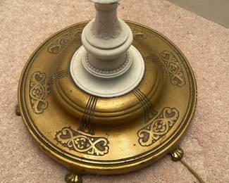 C56 - $75. Heavy Duty Brass Floor Lamp. Measures 62" tall. Bulbs can be turned on individually. Shade is in good condition! (White looks like the brass was painted). 