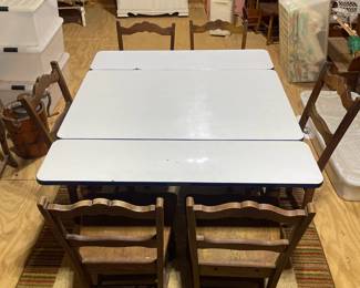 C86 - $175. Table Collapsed Measures 40" x 25" x 30" tall. Open it measures 40" x 45" x 30". Includes 6 Chairs. Enamel Coated Table Top with wood base. 6 chairs. Some rust spots & scratches but overall very good condition. Base has a sticker from Cochrane Furniture Co. Lincolnton, NC. Includes 6 Wooden Chairs. 