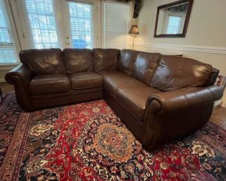 C83 - $500. Viceroy Leather Sectional. (Needs cleaned from dog hair) No rips / holes etc. Leather, Mocha, Hazelnut. Measures 87" from each corner. 34.5" deep x 34" tall. Floor to seat is 17.5" Seat is 21" deep. 