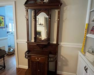 C81 - $275. Solid Wood Hall Tree - mirror has been replaced. Lots of carvings. Measures 39" wide x 16" deep x 88" tall. 