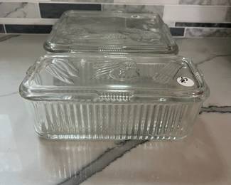 C130 - $30. 1940s Federal Glass Ribbed Refrigerator Dish Set. One minor chip noted on a lid. 