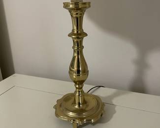 C149 - $30. Harvin Vintage Brass Lamp. Measures 24" tall. Shade has a small tear inside. 