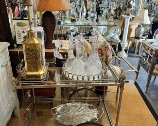 Maison Jansen style bar cart of polished steel and brass.