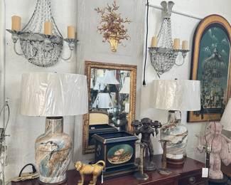 Pair Niermann Weeks Empire style sconces, Painted and parcel gilt French trumeau, Pair of Italian pottery lamps, Mahogany breakfront console with stringing, and more