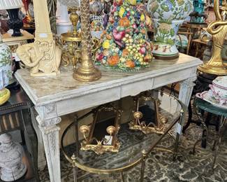 Painted Italian Neoclassical style console with faux top, Oval Jansen-style coffee table, Vintage pottery elephant obelisk, and more