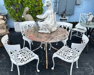 Set of four painted aluminum side chairs, 19th Century French cafe table with stone top, Kangaroo planter
